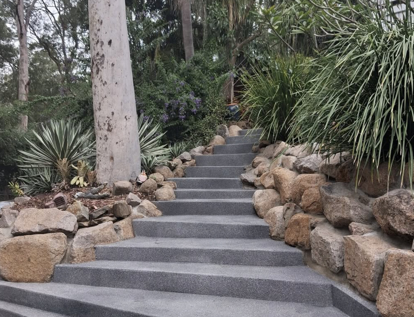 Charcoal textured garden steps after resurfacing